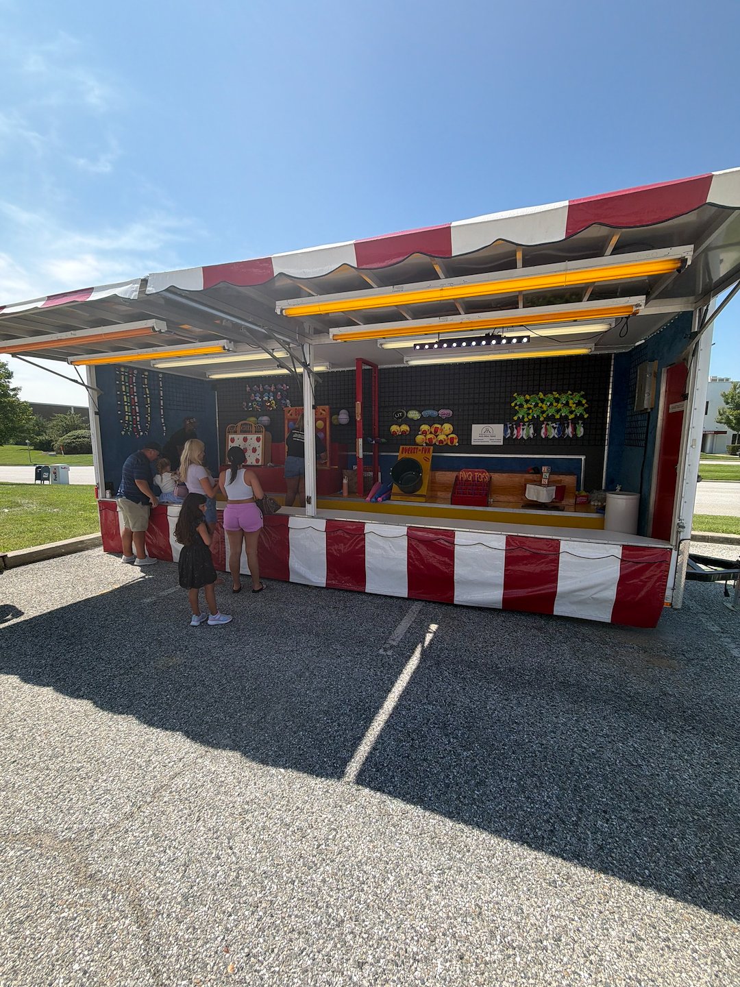 Nostalgic Carnival Game Trailers, Tents, and Inflatables for a Corporate Event in Glen Burnie, MD